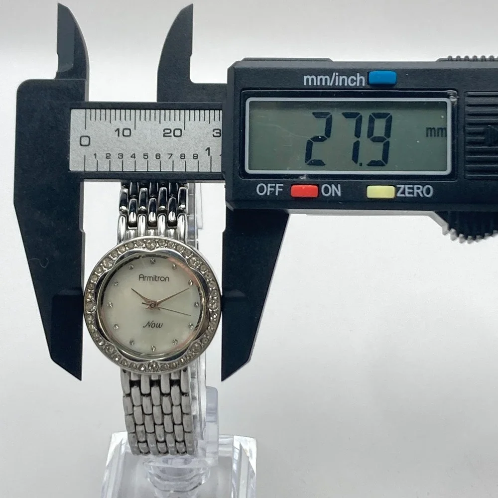 Armitron Now Women's Watch 28mm Silver Tone Crystals MOP Dial New Battery 6.75